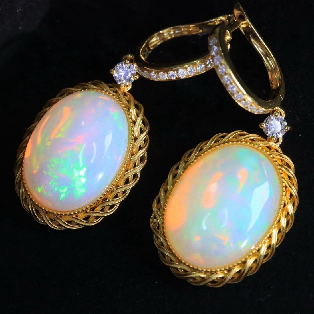 14k Gold 8.56 Ctw Natural Opal & Diamond Earrings: Ref:231163040 // gold content:14k gold // main gemstone:opal // shape:oval // carat weight:8. 3ct // color:color // treatment:natural // // adjacent gemstone 2 : diamond // shape:round // carat