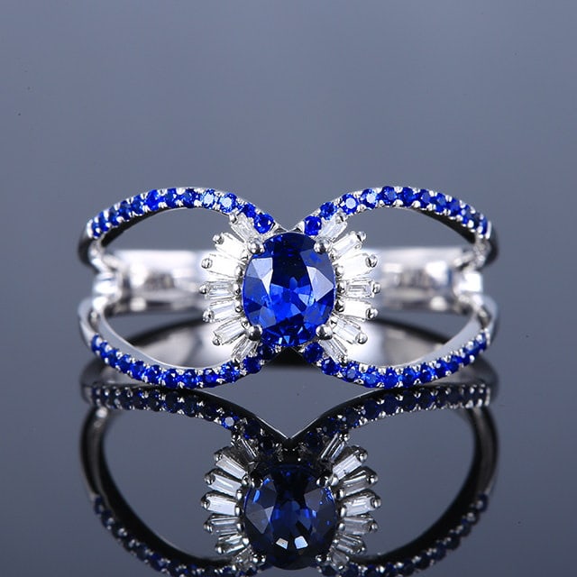 14k Gold 0.56 Ctw Natural Sapphire & Diamond Ring: Ref:231163082 // gold content:14k gold // ring size:7. 25us // // main gemstone:sapphire // shape:oval // carat weight:0. 48ct // color:blue // treatment:natural // // adjacent gemstone 2 : diamond