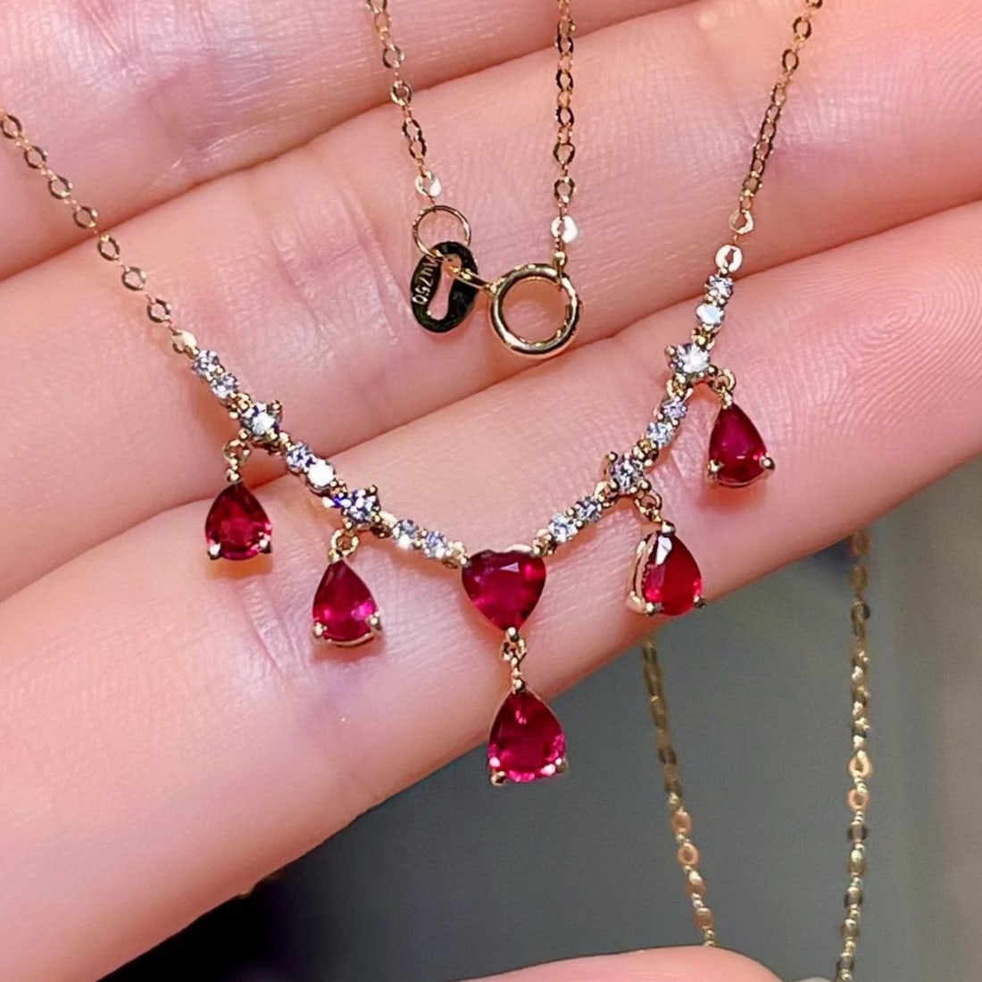 14k Gold 1.54 Ctw Natural Ruby & Diamond Necklace: Ref:231163122 // gold content:14k gold // main gemstone:ruby // number of stones:6 // shape:pear // carat weight:1. 32ct // color:red // treatment:natural // // adjacent gemstone 2 : diamond //