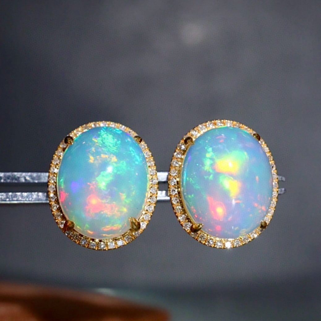 14k Gold 5.03 Ctw Natural Opal & Diamond Earrings: Ref:231163133 // gold content:14k gold // main gemstone:opal // shape:oval // carat weight:4. 8ct // color:color // treatment:natural // // adjacent gemstone 2 : diamond // shape:round // carat weight