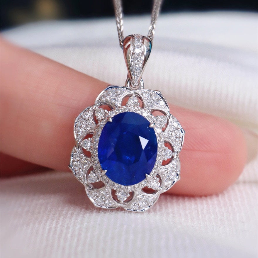 14k Gold 3.19 Ctw Natural Sapphire & Diamond Pendant( Without Chain ): Ref:231163220 // gold content:14k gold // main gemstone:sapphire // shape:oval // carat weight:2. 8ct // color:blue // treatment:natural // // adjacent gemstone 2 : diamond // shape:round // carat wei