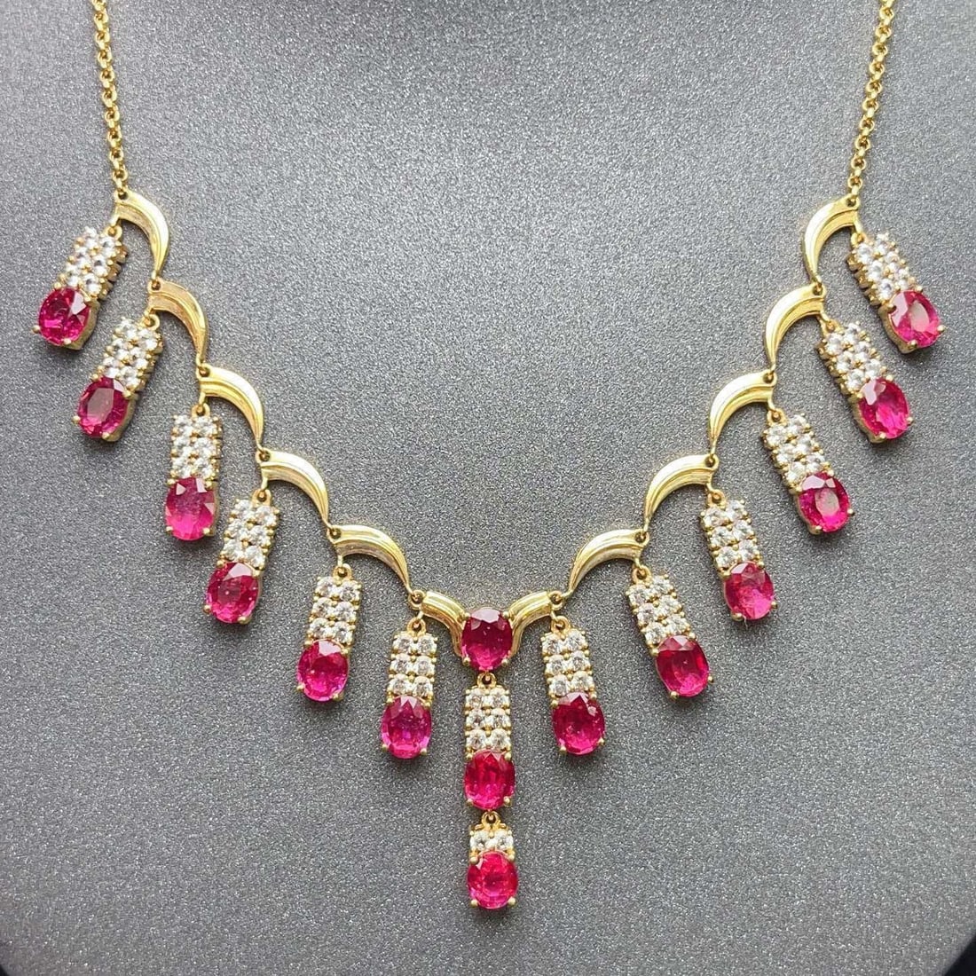 14k Gold 6.35 Ct Natural Ruby & Sapphire Necklace: Ref:231164013 // gold content:14k gold // main gemstone:ruby // shape:oval // carat weight:6. 35ct // color:red // treatment:natural // // adjacent gemstone 2 : sapphire // number of stones:80 // shap
