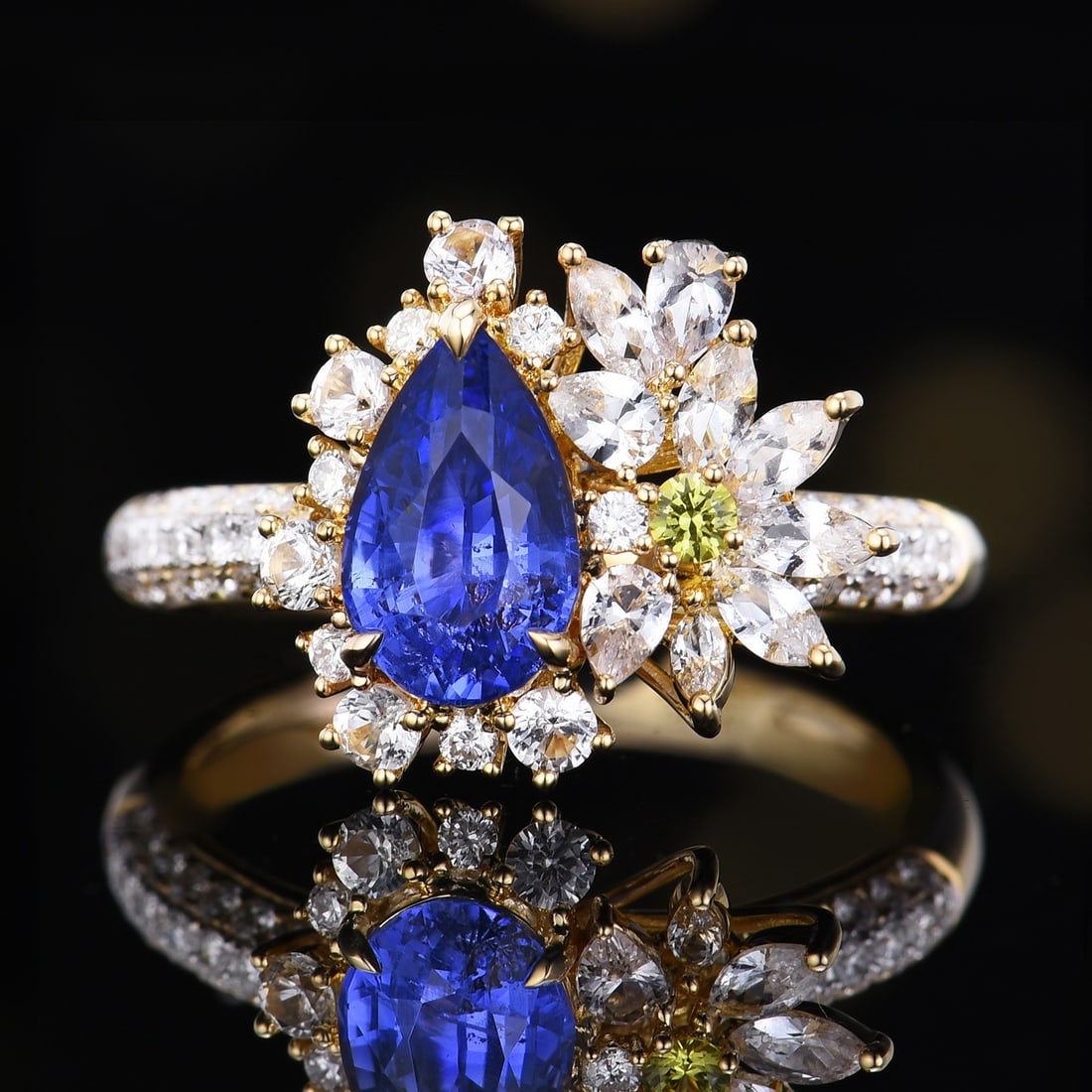 14k Gold 1.75 Ctw Natural Sapphire & Diamond Ring: Ref:231164036 // gold content:14k gold // ring size:7. 25us // // main gemstone:sapphire // shape:pear // carat weight:1. 4ct // color:cornflower blue // treatment:natural // // adjacent gemstone 2 : 