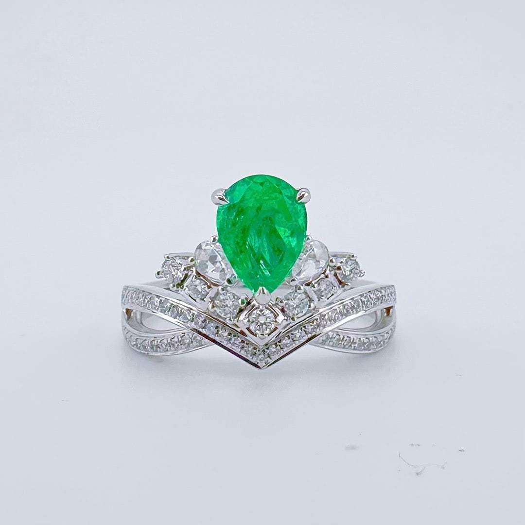 14k Gold 1.31 Ctw Natural Emerald & Diamond Ring: Ref:231164066 // gold content:14k gold // ring size:7. 25us // // main gemstone:emerald // shape:pear // carat weight:0. 95ct // color:green // treatment:natural // // adjacent gemstone 2 : diamond