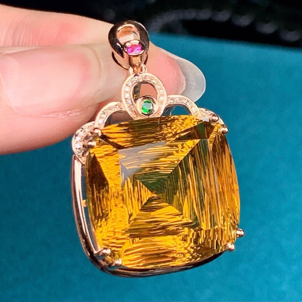 14k Gold 36.38 Ct Natural Citrine & Diamond Pendant( Without Chain ): Ref:231164079 // gold content:14k gold // main gemstone:citrine // shape:cushion // carat weight:36. 38ct // color:yellow // treatment:natural // // adjacent gemstone 2 : diamond // shape:round //