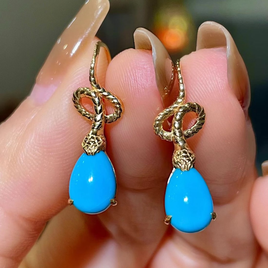 14k Gold 2.53 Ct Natural Blue Turquoise Earrings: Ref:231164186 // gold content:14k gold // main gemstone:blue turquoise // shape:pear // carat weight:2. 53ct // color:blue // treatment:natural // Low Estimate: 2400 Condition: New High Estimate: 3600
