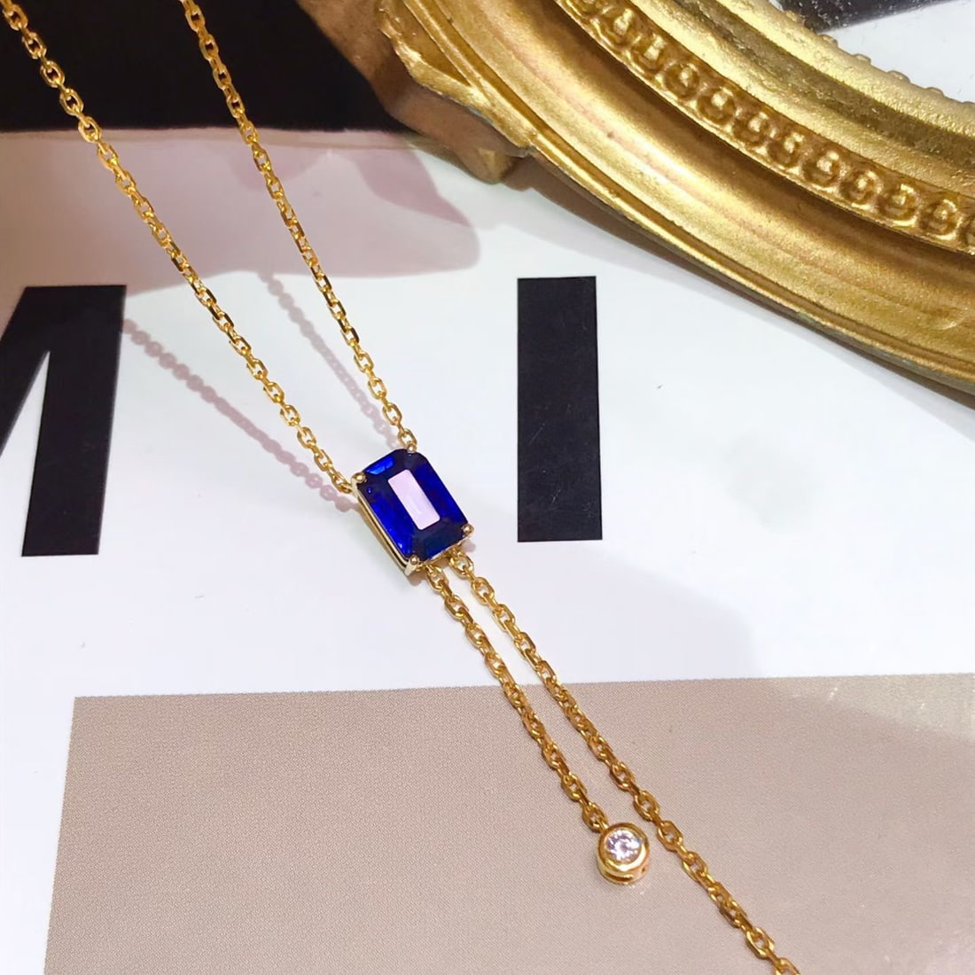 14k Gold 1.36 Ct Vivid Blue Natural Sapphire & Diamond Necklace: Ref:231164196 // gold content:14k gold // main gemstone:sapphire // shape:octagonal // carat weight:1. 36ct // color:vivid blue // treatment:natural // // adjacent gemstone 2 : diamond // number of