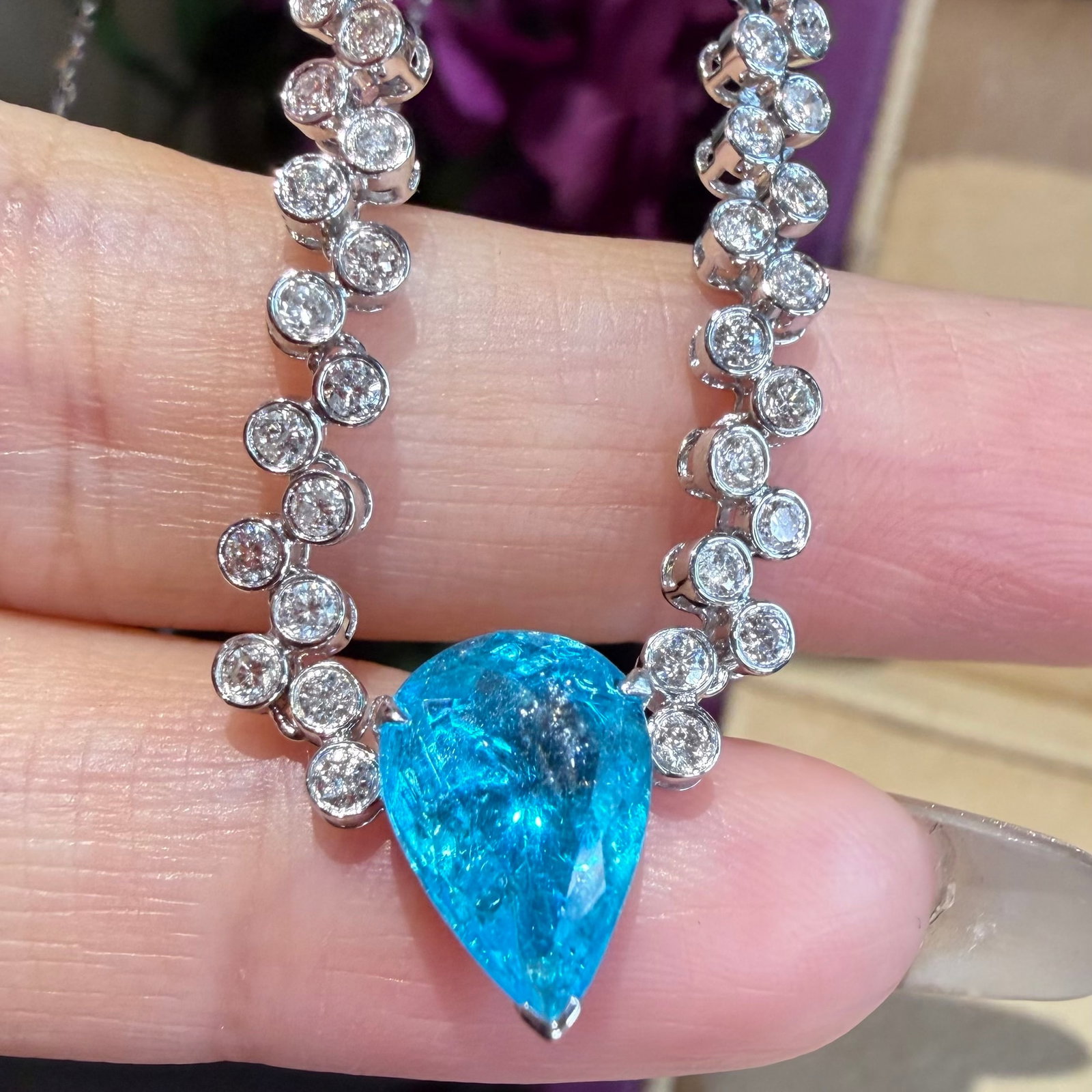 14k Gold 2.2 Ctw Natural Paraiba Tourmaline & Diamond Necklace: Ref:231164218 // gold content:14k gold // main gemstone:paraiba tourmaline // shape:pear // carat weight:1. 7ct // color:blue // treatment:natural // // adjacent gemstone 2 : diamond // shape:round //