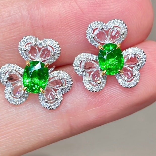 14k Gold 1.26 Ct Natural Tsavorite & Diamond & Sapphire Earrings: Ref:231164230 // gold content:14k gold // main gemstone:tsavorite // shape:oval // carat weight:1. 26ct // color:green // treatment:natural // // adjacent gemstone 2 : diamond // shape:round //