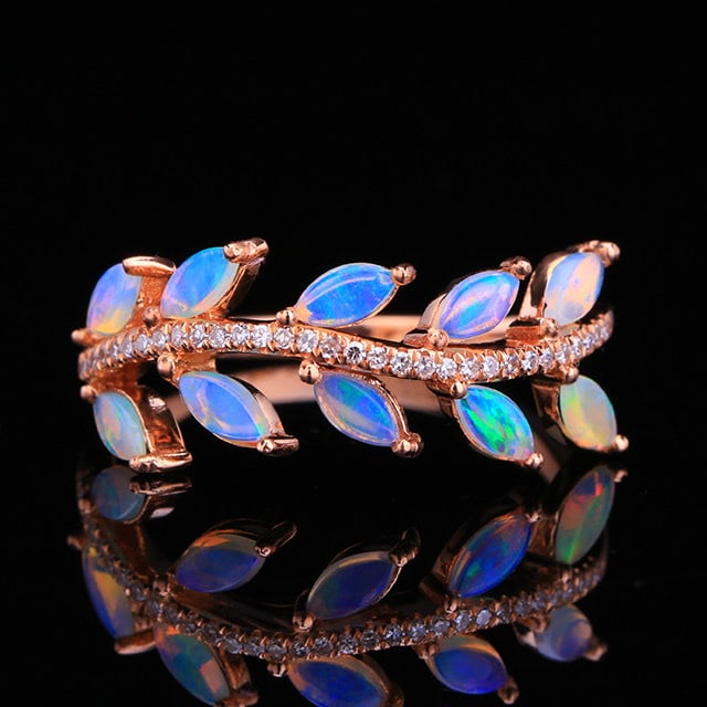 14k Gold 0.52 Ctw Natural Opal & Diamond Ring: Ref:231164236 // gold content:14k gold // ring size:7. 25us // // main gemstone:opal // shape:marquise // carat weight:0. 43ct // color:color // treatment:natural // // adjacent gemstone 2 : diamond
