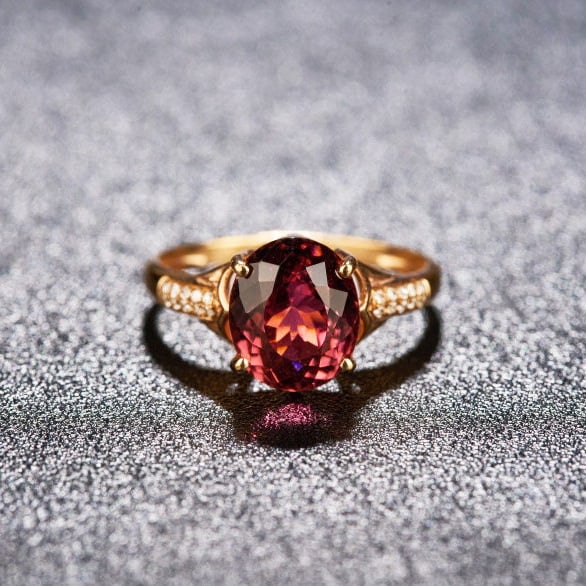 14k Gold 3.85 Ct Natural Tourmaline & Diamond Ring: Ref:231164259 // gold content:14k gold // ring size:7. 25us // // main gemstone:tourmaline // shape:oval // carat weight:3. 85ct // color:red // treatment:natural // // adjacent gemstone 2 : diamond
