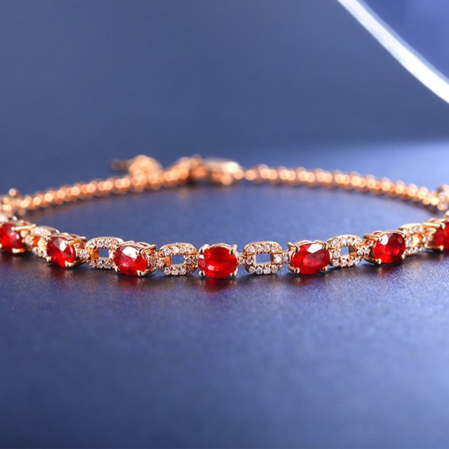 14k Gold 2.69 Ctw Natural Ruby & Diamond Bracelet: Ref:231164276 // gold content:14k gold // main gemstone:ruby // shape:oval // carat weight:2. 42ct // color:red // treatment:natural // // adjacent gemstone 2 : diamond // number of stones:92 //
