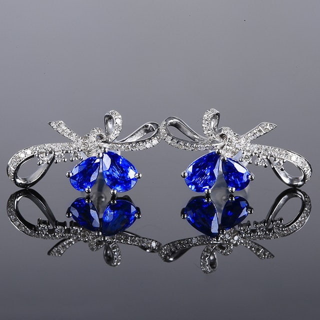 14k Gold 1.80 Ctw Natural Sapphire & Diamond Earrings: Ref:231164277 // gold content:14k gold // main gemstone:sapphire // shape:pear // carat weight:1. 5ct // color:blue // treatment:natural // // adjacent gemstone 2 : diamond // number of stones:86 //