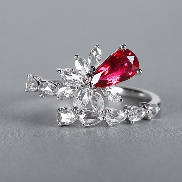 14k Gold 1.58 Ctw Natural Ruby & Diamond Ring: Ref:231164306 // gold content:14k gold // ring size:7. 25us // // main gemstone:ruby // shape:pear // carat weight:1. 02ct // color:red // treatment:natural // // adjacent gemstone 2 : diamond // numb