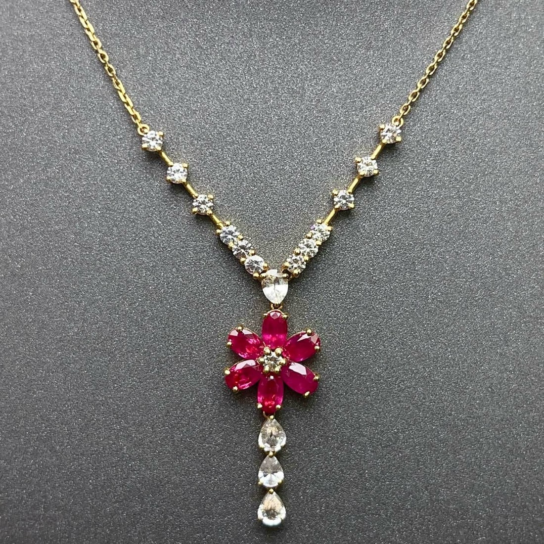 14k Gold 2.50 Ct Natural Ruby & Sapphire Necklace: Ref:231164318 // gold content:14k gold // main gemstone:ruby // shape:oval // carat weight:2. 50ct // color:red // treatment:natural // // adjacent gemstone 2 : sapphire // number of stones:17 //