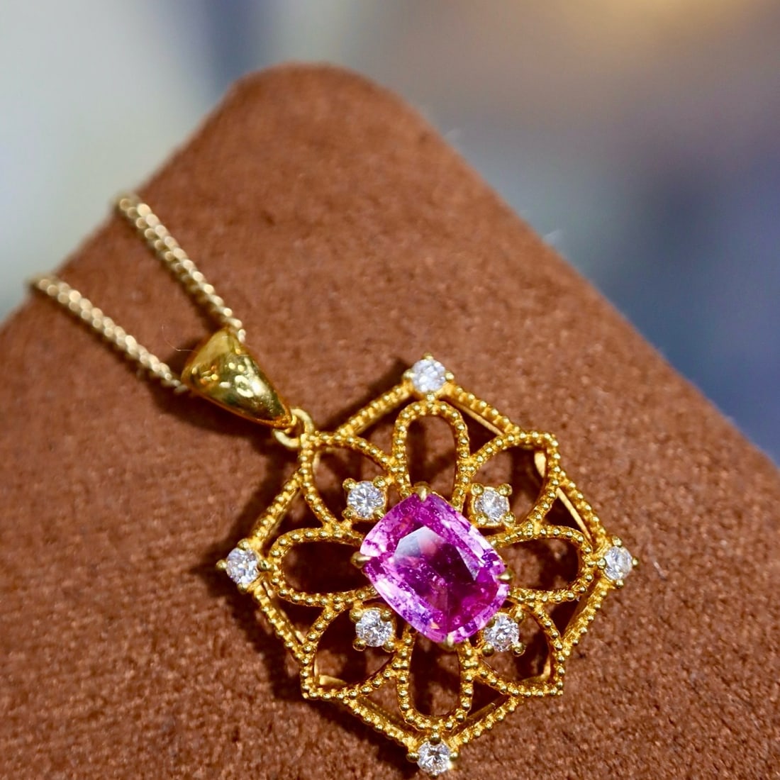 14k Gold 0.87 Ctw Natural Padparadscha Sapphire & Diamond Pendant( Without Chain ): Ref:231164334 // gold content:14k gold // main gemstone:padparadscha sapphire // shape:cushion // carat weight:0. 73ct // color:orangish pink // treatment:natural // // adjacent gemstone 2 : diamond