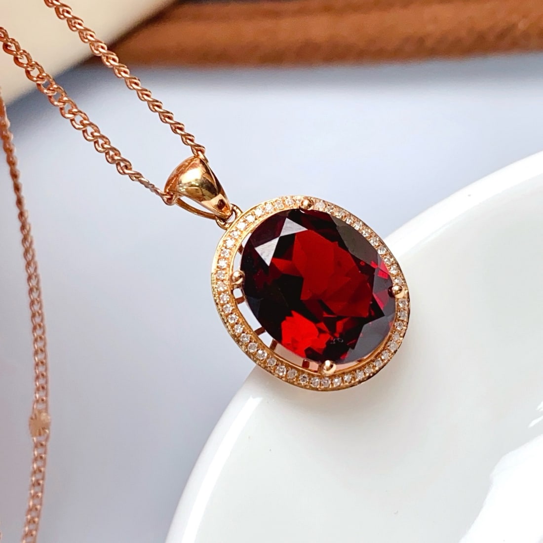 14k Gold 5.50 Ct Natural Garnet & Diamond Pendant( Without Chain ): Ref:231164344 // gold content:14k gold // main gemstone:garnet // shape:oval // carat weight:5. 50ct // color:red // treatment:natural // // adjacent gemstone 2 : diamond // number of stones:52 //