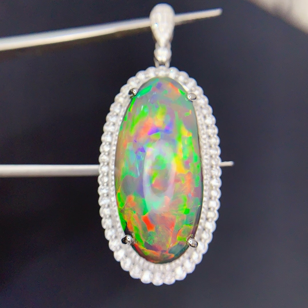 14k Gold 23.5 Ct Natural Opal & Diamond Pendant( Without Chain ): Ref:231164349 // gold content:14k gold // main gemstone:opal // shape:oval // carat weight:23. 5ct // color:color // treatment:natural // // adjacent gemstone 2 : diamond // shape:round // clarity gra