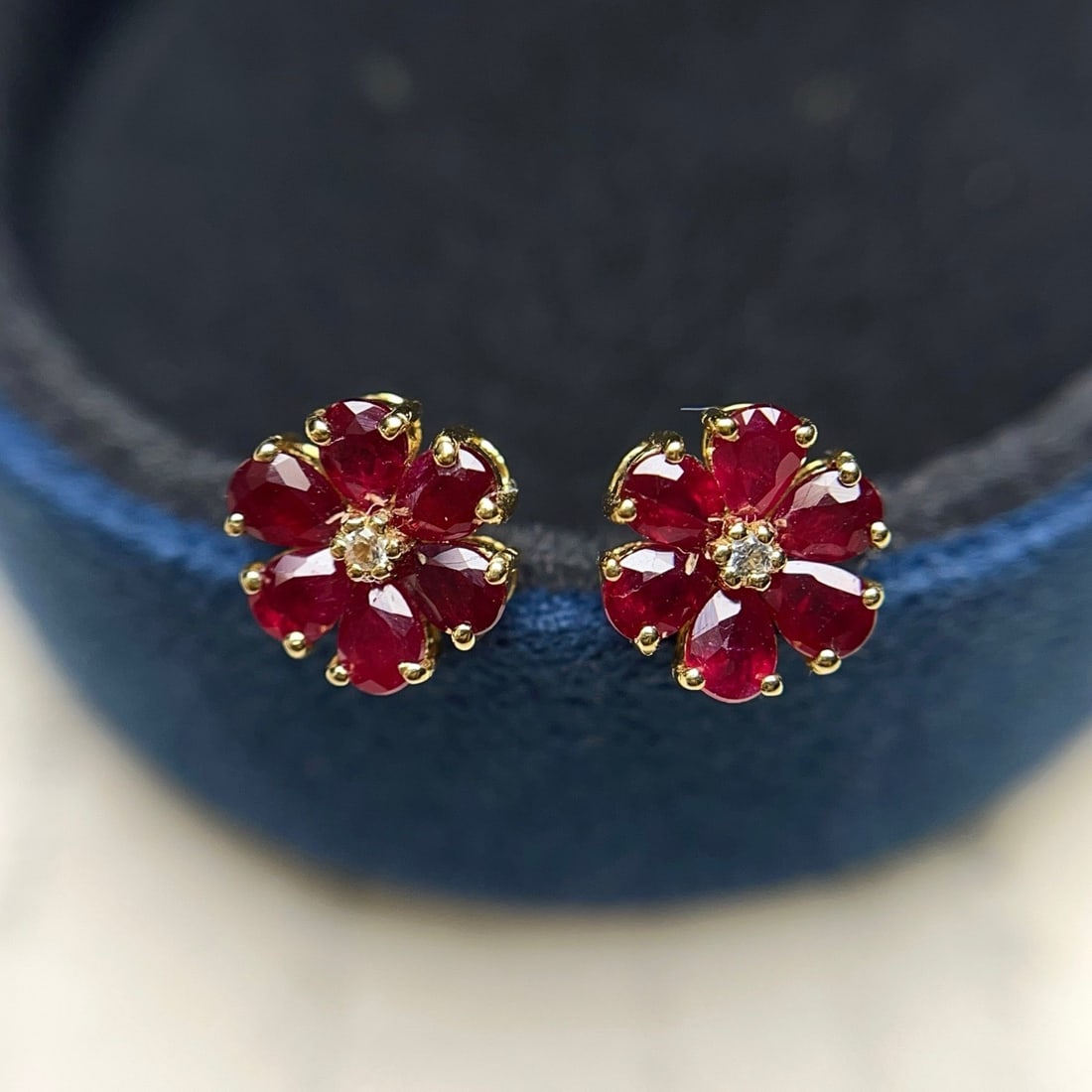 14k Gold 1.88 Ct Natural Ruby & Sapphire Earrings: Ref:231164379 // gold content:14k gold // main gemstone:ruby // shape:pear // carat weight:1. 88ct // color:red // treatment:natural // // adjacent gemstone 2 : sapphire // number of stones:2 // shape