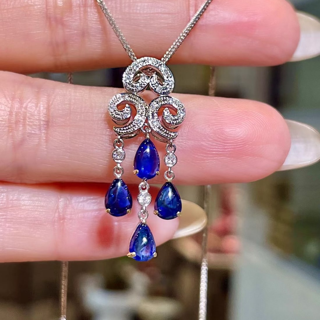 14k Gold 1.82 Ctw Natural Sapphire & Diamond Pendant( Without Chain ): Ref:231164444 // gold content:14k gold // main gemstone:sapphire // shape:pear // carat weight:1. 71ct // color:blue // treatment:natural // // adjacent gemstone 2 : diamond // shape:round // carat