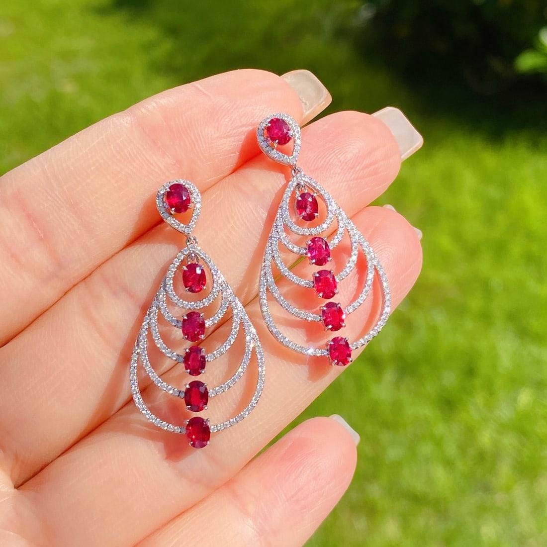 14k Gold 3.41 Ctw Natural Ruby & Diamond Earrings: Ref:231164445 // gold content:14k gold // main gemstone:ruby // shape:oval // carat weight:2. 69ct // color:red // treatment:natural // // adjacent gemstone 2 : diamond // shape:round // carat