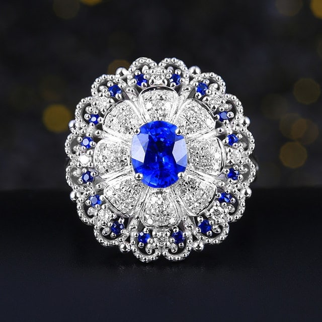 14k Gold 1.23 Ctw Natural Sapphire & Sapphire Ring: Ref:231151003 // gold content:14k gold // ring size:7. 25us // // main gemstone:sapphire // shape:oval // carat weight:1. 15ct // color:blue // treatment:natural // // adjacent gemstone 2 : sapphire