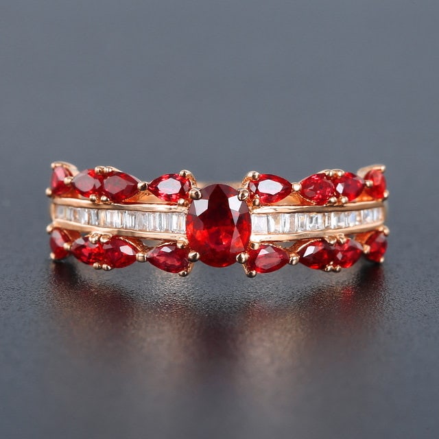 14k Gold 1.02 Ctw Natural Ruby & Ruby Ring: Ref:231151207 // gold content:14k gold // ring size:7. 25us // // main gemstone:ruby // shape:oval // carat weight:0. 38ct // color:red // treatment:natural // // adjacent gemstone 2 : ruby // shape:p