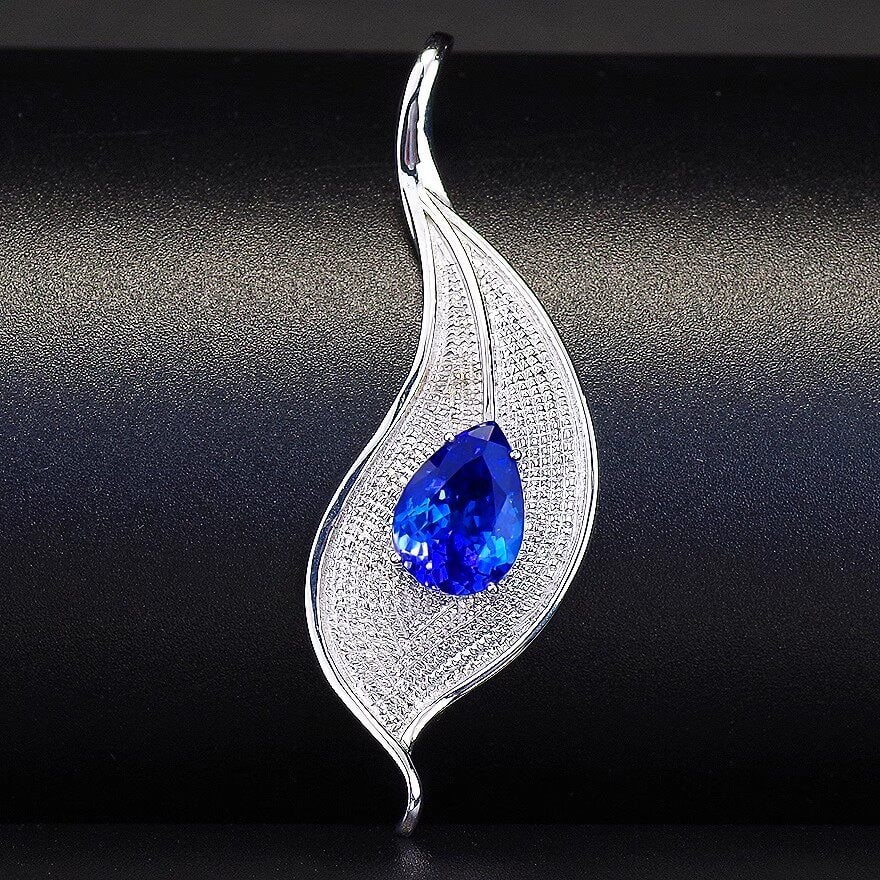 14k Gold 2.80 Ct Natural Tanzanite Pendant( Without Chain ): Ref:231152006 // gold content:14k gold // main gemstone:tanzanite // shape:pear // carat weight:2. 80ct // color:blue // treatment:natural // Condition: New Low Estimate: 9200.00 High Estimate: