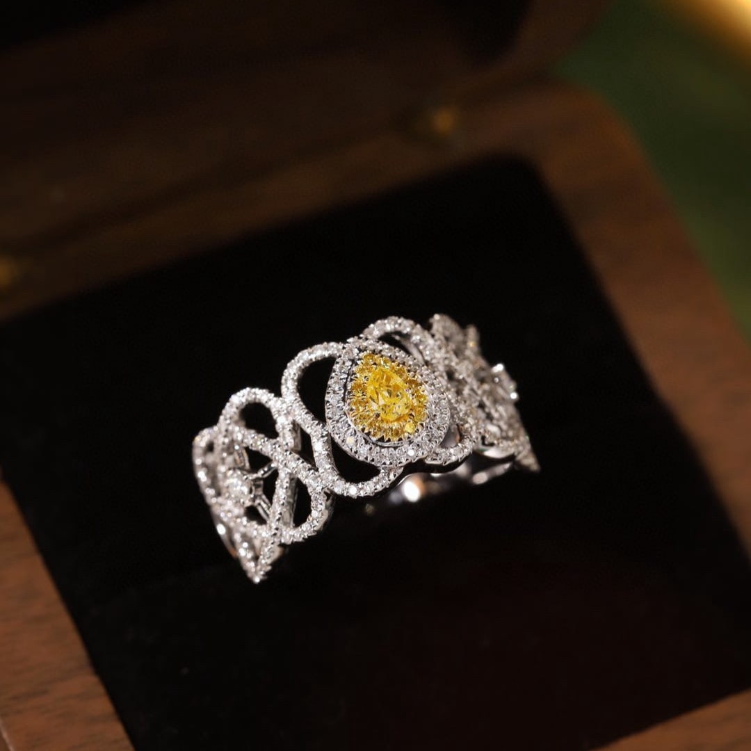 14k Gold 0.55 Ctw Natural Yellow Diamond & Diamond Ring: Ref:231165041 // gold content:14k gold // ring size:7. 25us // // main gemstone:yellow diamond // shape:pear // carat weight:0. 1ct // color:yellow // treatment:natural // // adjacent gemstone 2 :