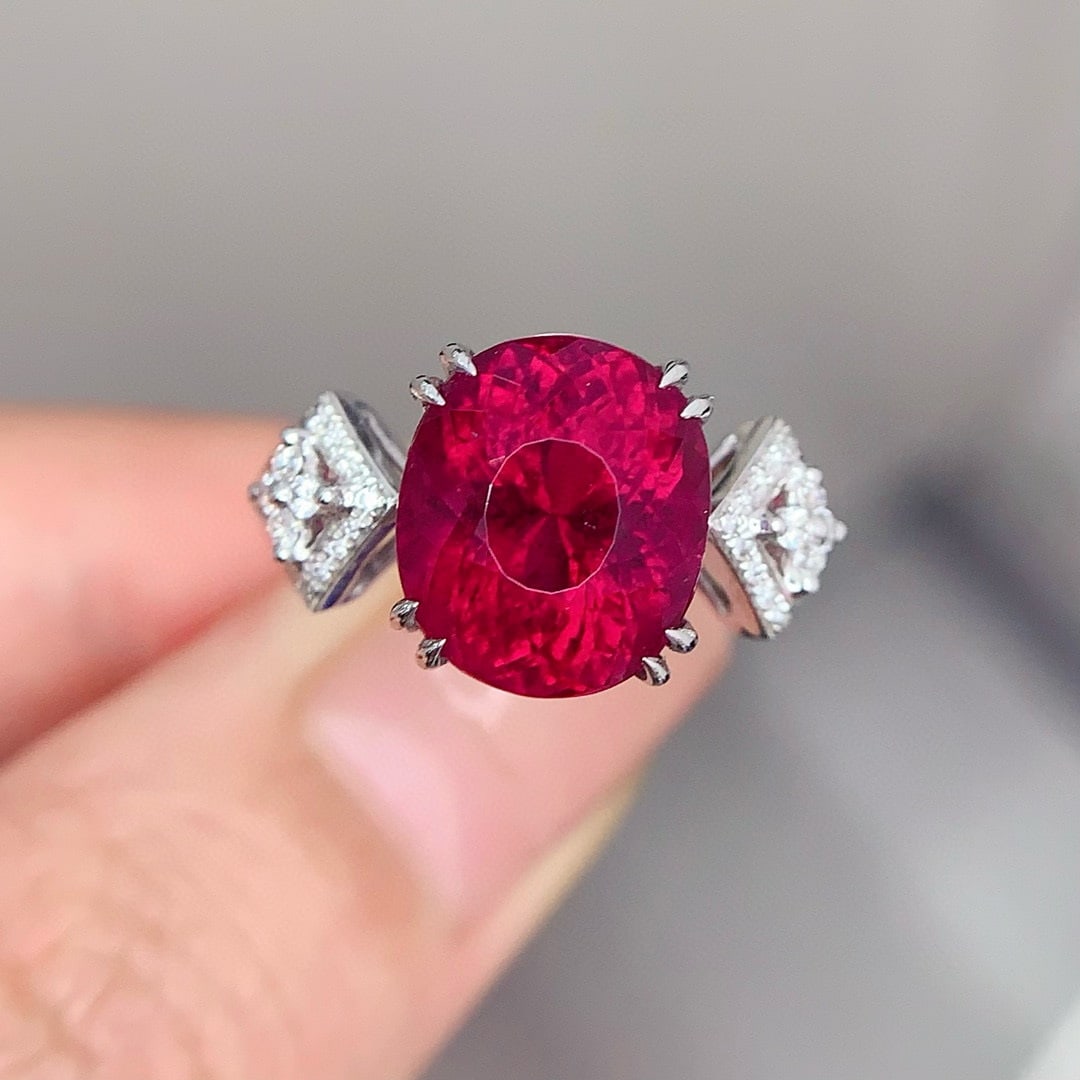 14k Gold 6.5 Ct Natural Tourmaline & Diamond Ring: Ref:231165065 // gold content:14k gold // ring size:7. 25us // // main gemstone:tourmaline // shape:oval // carat weight:6. 5ct // color:red // treatment:natural // // adjacent gemstone 2 : diamond