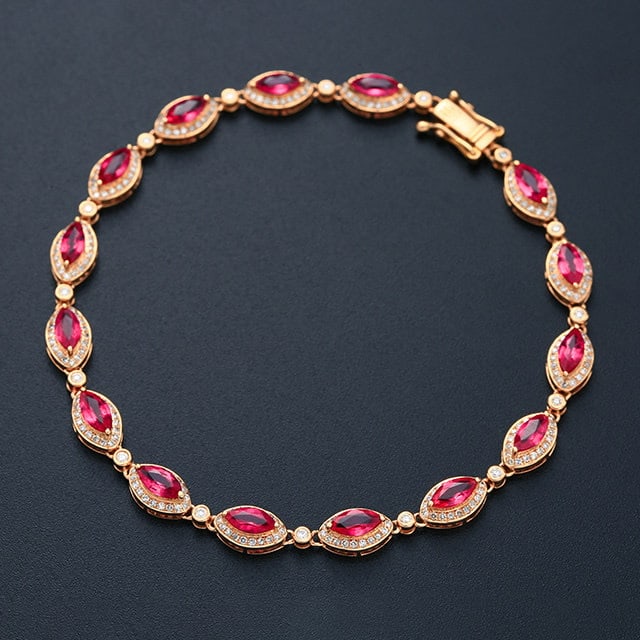 14k Gold 4.62 Ctw Natural Ruby & Diamond Bracelet: Ref:231165125 // gold content:14k gold // main gemstone:ruby // shape:marquise // carat weight:3. 65ct // color:red // treatment:natural // // adjacent gemstone 2 : diamond // number of stones:286 // 