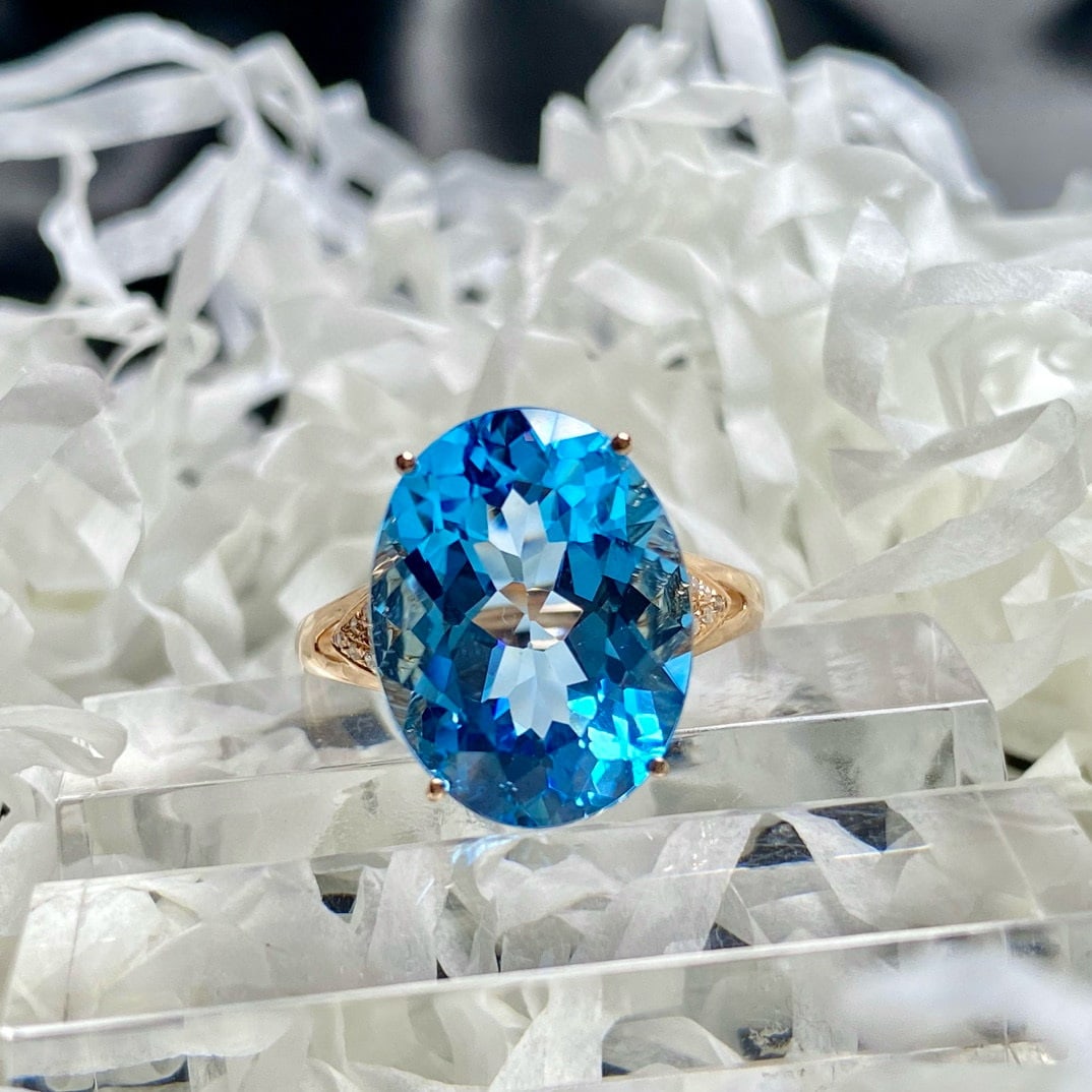 14k Gold 9.25 Ct Natural Topaz & Diamond Ring: Ref:231165150 // gold content:14k gold // ring size:7. 25us // // main gemstone:topaz // shape:oval // carat weight:9. 25ct // color:blue // treatment:natural // // adjacent gemstone 2 : diamond //