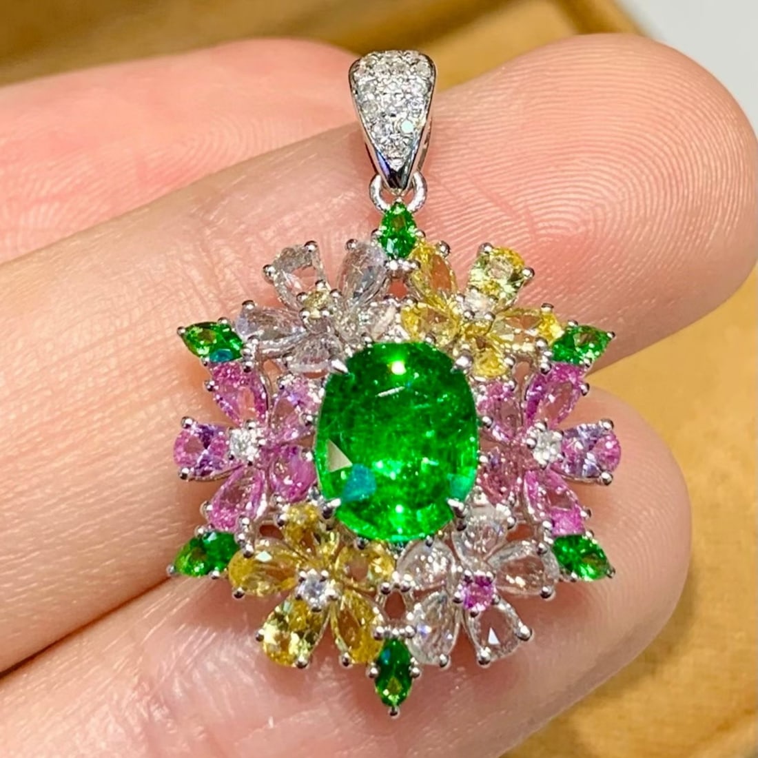 14k Gold 1.65 Ct Natural Tsavorite & Diamond & Coloured Gemstone Pendant( Without Chain ): Ref:231165159 // gold content:14k gold // main gemstone:tsavorite // shape:oval // carat weight:1. 65ct // color:green // treatment:natural // // adjacent gemstone 2 : diamond // shape:round //
