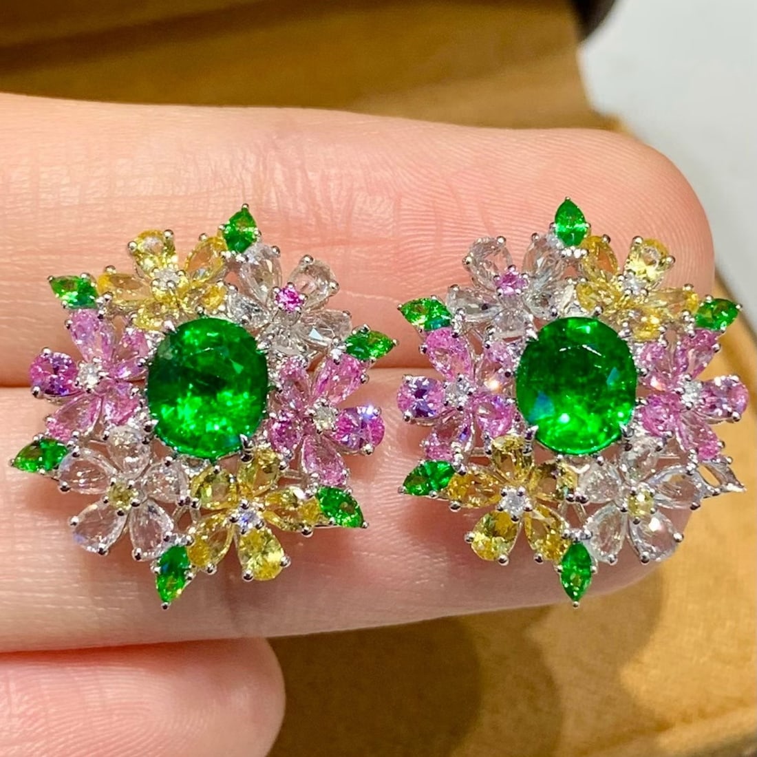 14k Gold 2.8 Ct Natural Tsavorite & Diamond & Coloured Gemstone Earrings: Ref:231165160 // gold content:14k gold // main gemstone:tsavorite // shape:oval // carat weight:2. 8ct // color:green // treatment:natural // // adjacent gemstone 2 : diamond // shape:round //