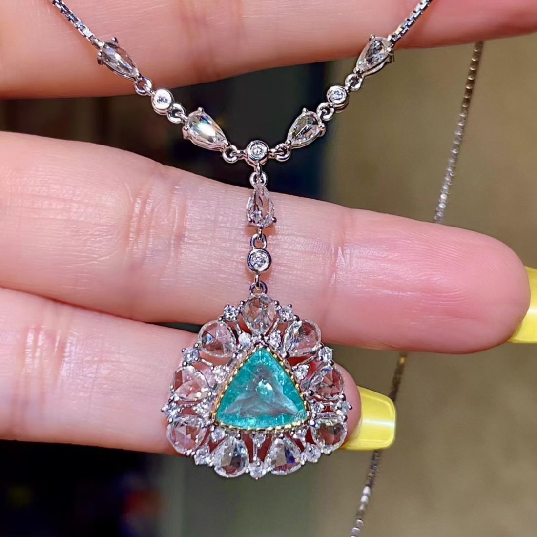 14k Gold 3.30 Ctw Natural Paraiba Tourmaline & Diamond Necklace: Ref:231165161 // gold content:14k gold // main gemstone:paraiba tourmaline // shape:triangle // carat weight:1. 19ct // color:blue // treatment:natural // // adjacent gemstone 2 : diamond //