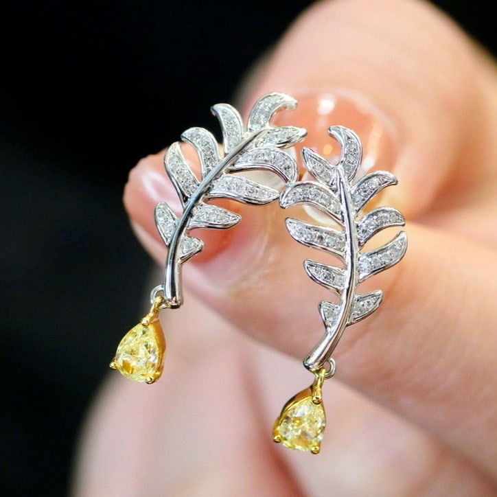 14k Gold 0.63 Ctw Natural Yellow Diamond & Diamond Earrings: Ref:231165191 // gold content:14k gold // main gemstone:yellow diamond // shape:pear // carat weight:0. 51ct // color:yellow // treatment:natural // // adjacent gemstone 2 : diamond // shape:round //