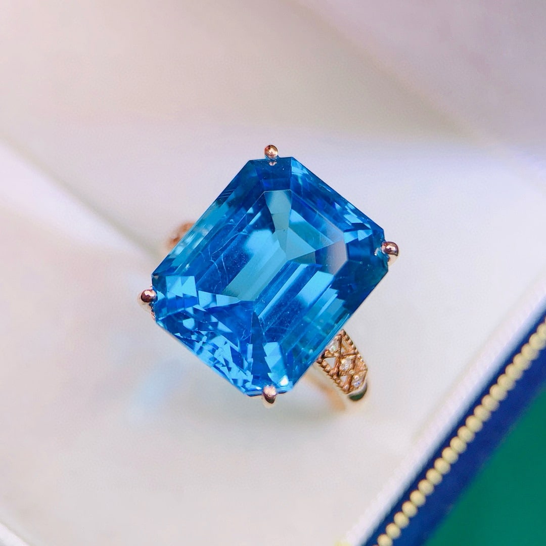 14k Gold 14.18 Ctw Natural Topaz & Diamond Ring: Ref:231165242 // gold content:14k gold // ring size:7. 25us // // main gemstone:topaz // shape:octagonal // carat weight:14. 15ct // color:blue // treatment:natural // // adjacent gemstone 2 :
