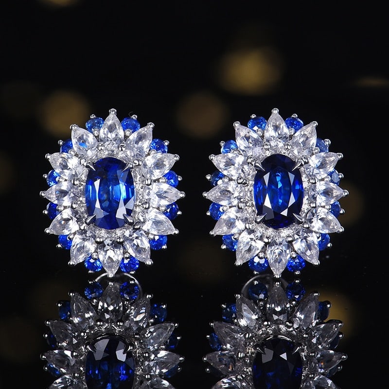 14k Gold 1.38 Ct Natural Sapphire & Sapphire & Sapphire Earrings: Ref:231166006 // gold content:14k gold // main gemstone:sapphire // shape:oval // carat weight:1. 38ct // color:blue // treatment:natural // // adjacent gemstone 2 : sapphire // number of stones:24