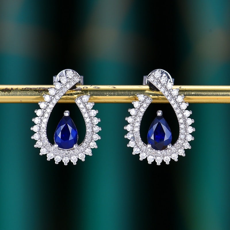 14k Gold 1.77 Ctw Natural Sapphire & Diamond Earrings: Ref:231166010 // gold content:14k gold // main gemstone:sapphire // shape:pear // carat weight:1. 24ct // color:royal blue // treatment:natural // // adjacent gemstone 2 : diamond // number of