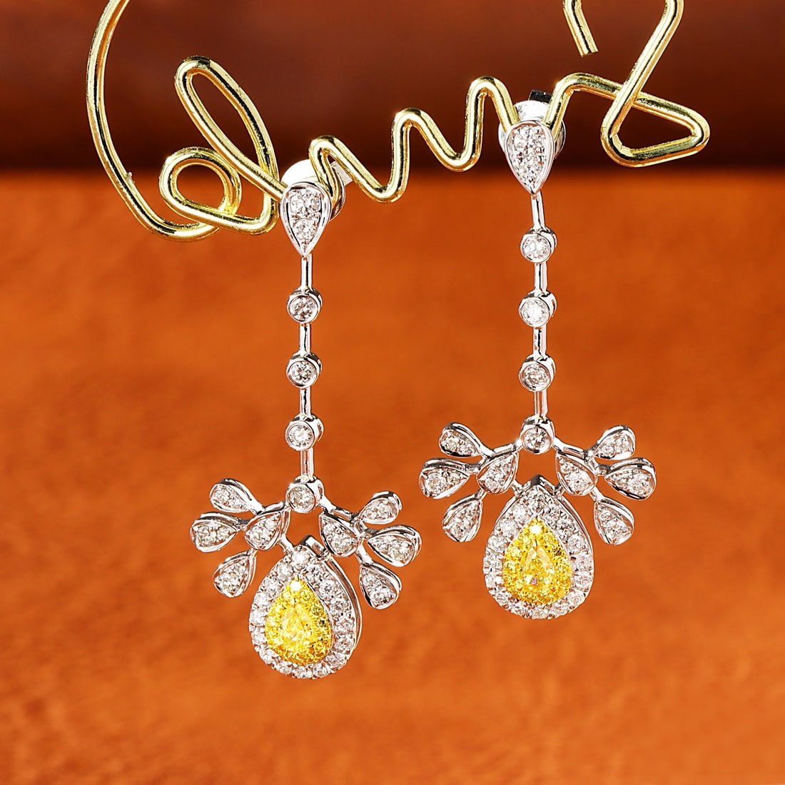 14k Gold 0.96 Ctw Natural Yellow Diamond & Diamond Earrings: Ref:231166018 // gold content:14k gold // main gemstone:yellow diamond // shape:pear // carat weight:0. 20ct // color:yellow // treatment:natural // // adjacent gemstone 2 : diamond // shape:round //
