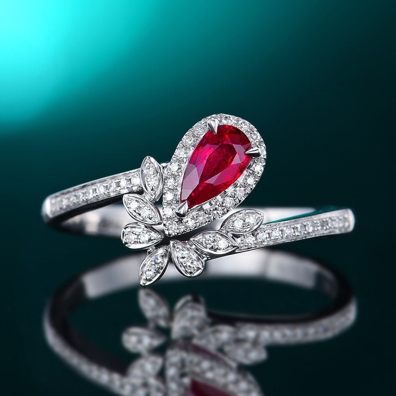 14k Gold 0.45 Ctw Natural Ruby & Diamond Ring: Ref:231166025 // gold content:14k gold // ring size:7. 25us // // main gemstone:ruby // shape:pear // carat weight:0. 31ct // color:red // treatment:natural // // adjacent gemstone 2 : diamond //