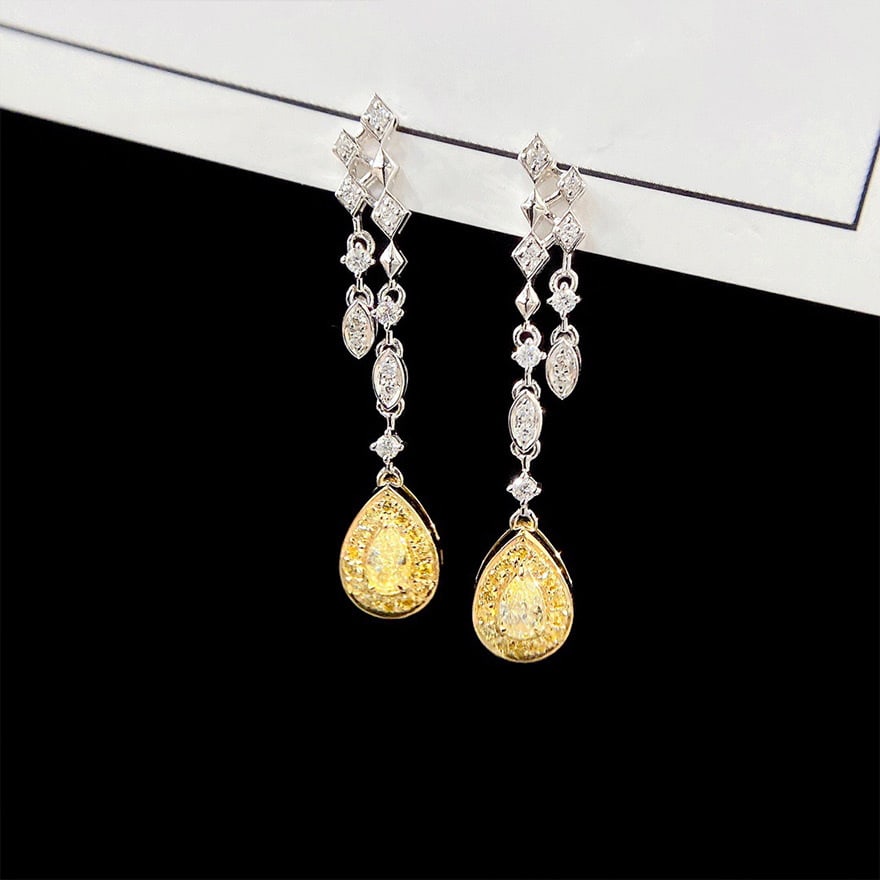 14k Gold 0.45 Ctw Natural Yellow Diamond & Diamond Earrings: Ref:231166049 // gold content:14k gold // main gemstone:yellow diamond // shape:pear // carat weight:0. 2ct // color:yellow // treatment:natural // // adjacent gemstone 2 : diamond // shape:round //