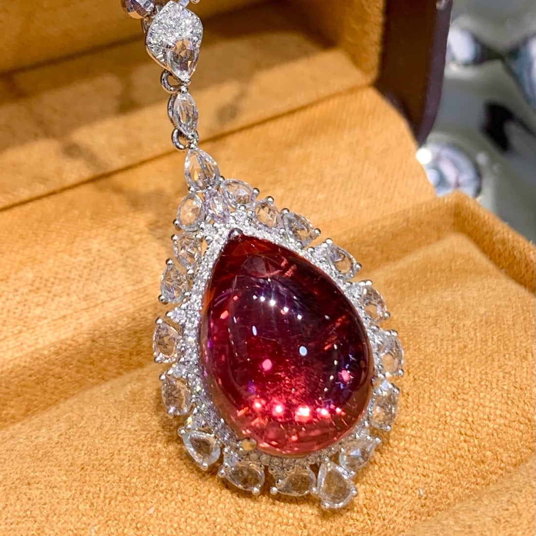 14k Gold 10.7 Ct Natural Tourmaline & Diamond & Sapphire Pendant( Without Chain ): Ref:231166057 // gold content:14k gold // main gemstone:tourmaline // shape:pear // carat weight:10. 7ct // color:red // treatment:natural // // adjacent gemstone 2 : diamond // shape:round //
