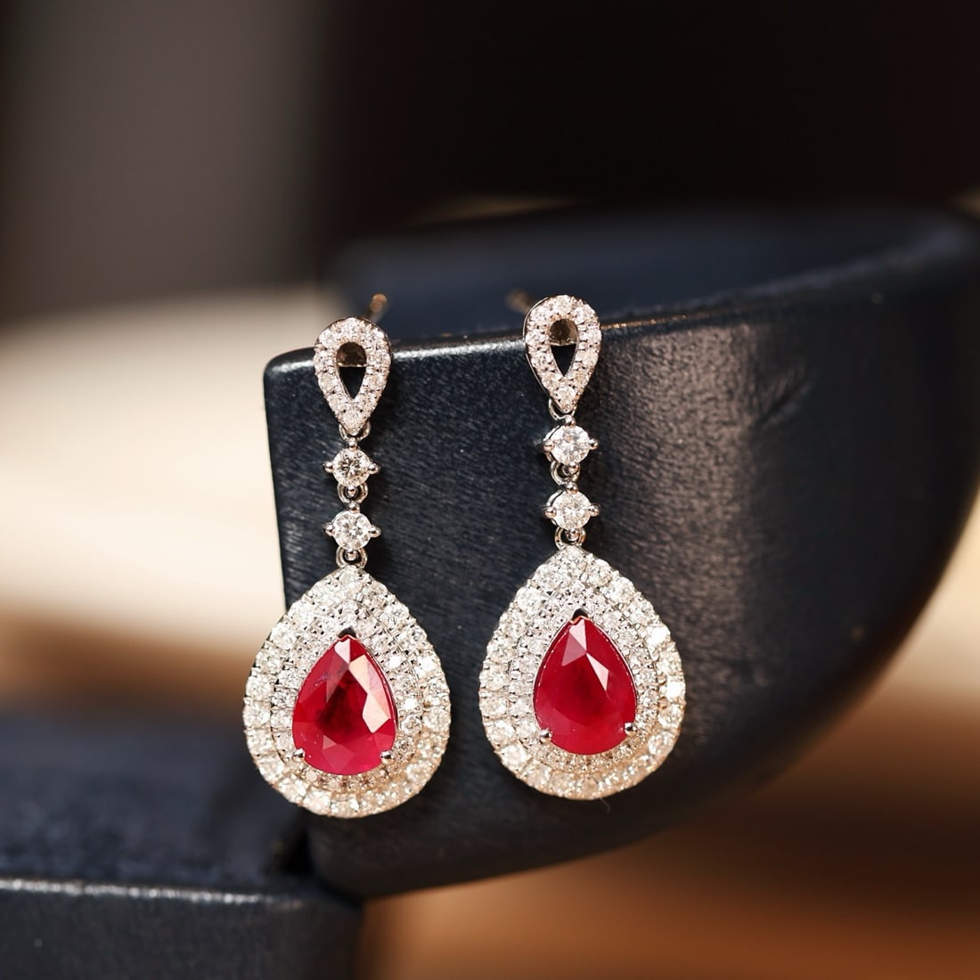 14k Gold 2.96 Ctw Natural Ruby & Diamond Earrings: Ref:231166078 // gold content:14k gold // main gemstone:ruby // shape:pear // carat weight:2. 07ct // color:pigeonblood red // treatment:natural // // adjacent gemstone 2 : diamond // shape:round //