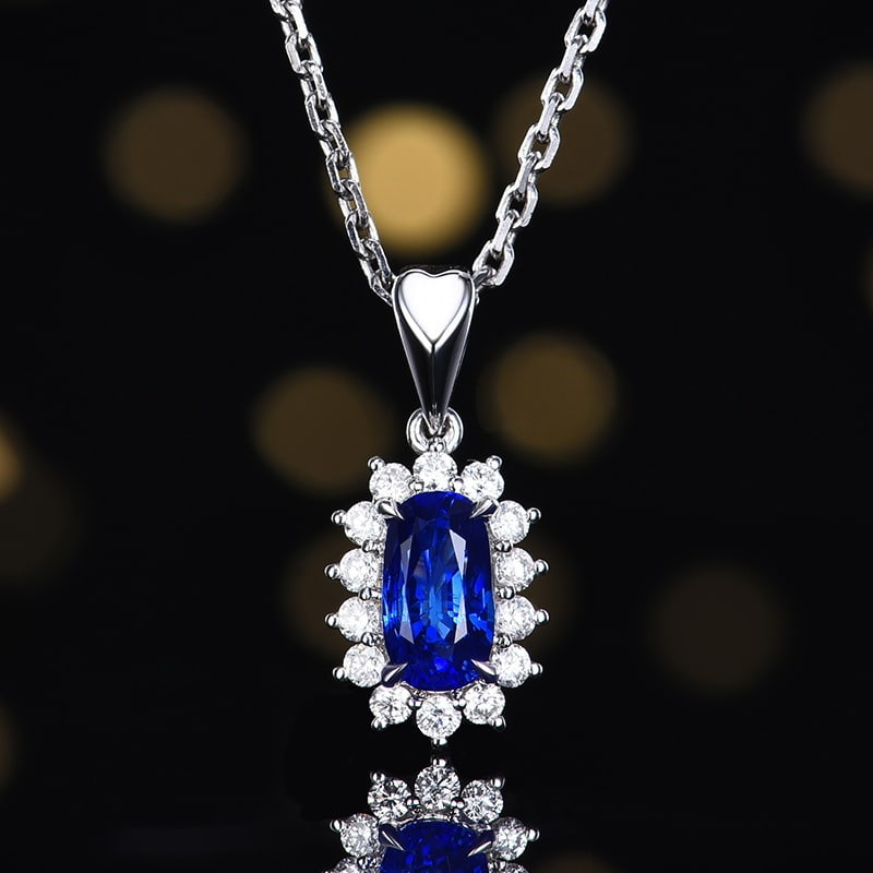 14k Gold 1.22 Ctw Natural Sapphire & Diamond Pendant( Without Chain ): Ref:231166092 // gold content:14k gold // main gemstone:sapphire // shape:oval // carat weight:0. 98ct // color:blue // treatment:natural // // adjacent gemstone 2 : diamond // number of stones:14 //