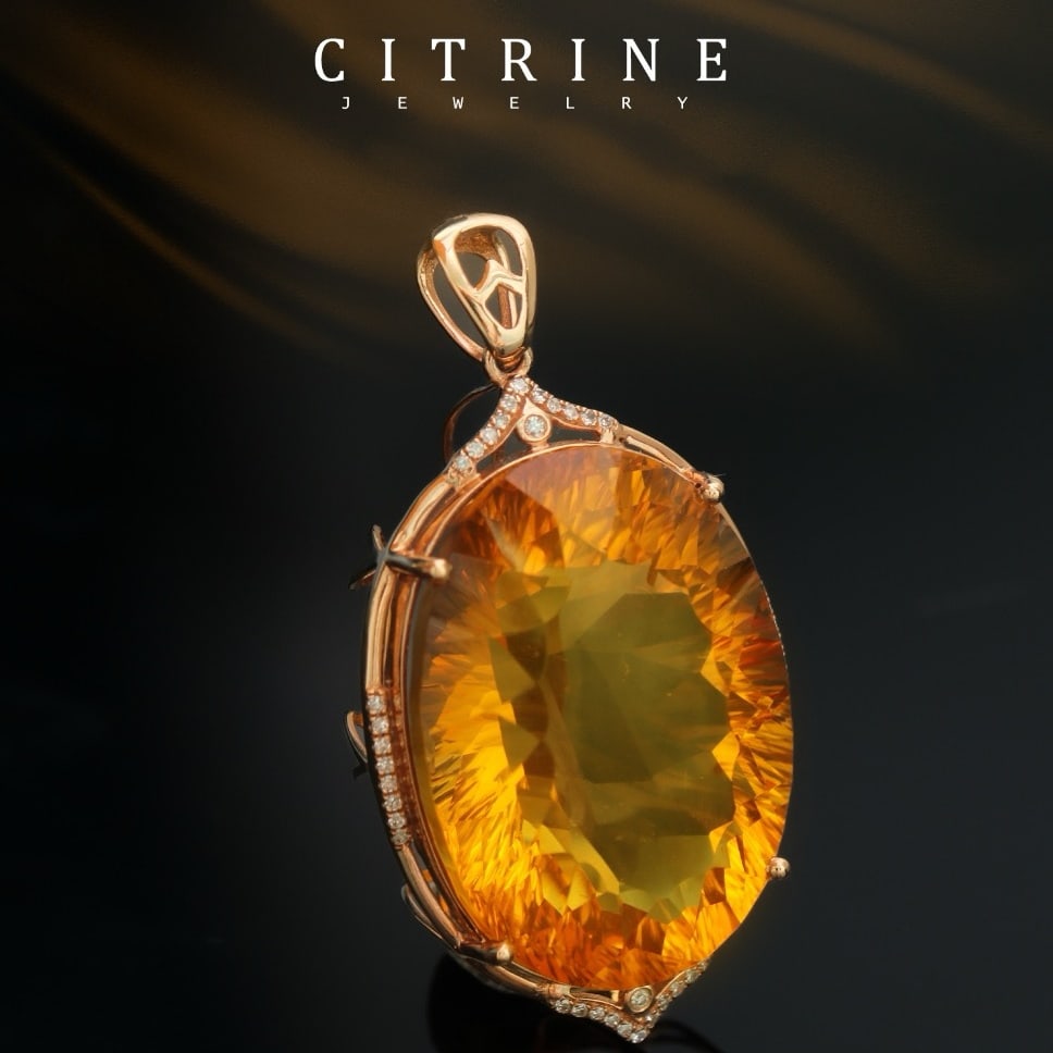 14k Gold 39.52 Ctw Natural Citrine & Diamond Pendant( Without Chain ): Ref:231166108 // gold content:14k gold // main gemstone:citrine // shape:oval // carat weight:39. 4ct // color:yellow // treatment:natural // // adjacent gemstone 2 : diamond // number of stones:40