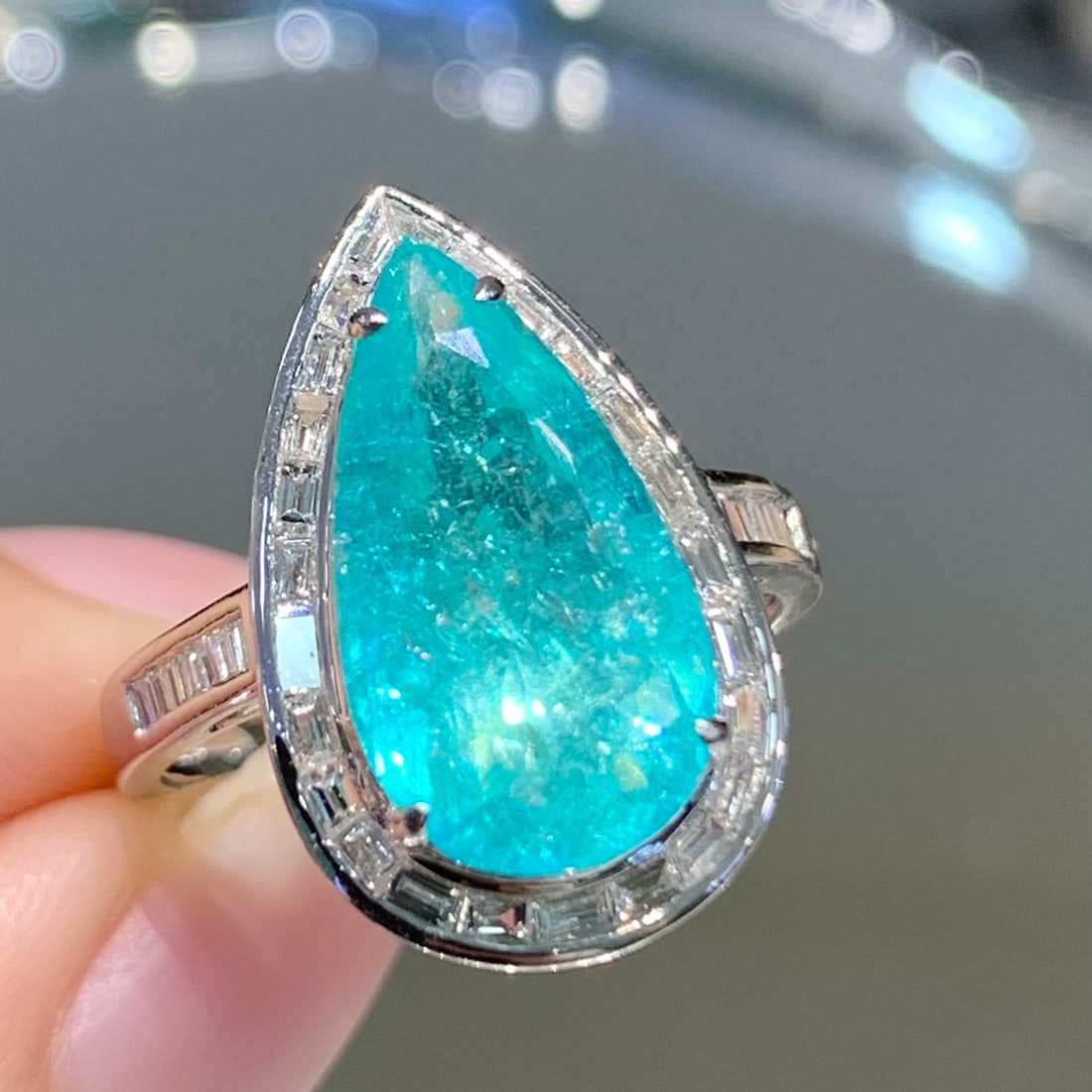 14k Gold 4.3 Ct Natural Paraiba Tourmaline & Diamond Ring: Ref:231166169 // gold content:14k gold // ring size:7. 25us // // main gemstone:paraiba tourmaline // shape:pear // carat weight:4. 3ct // color:blue // treatment:natural // // adjacent gemstone 2 :