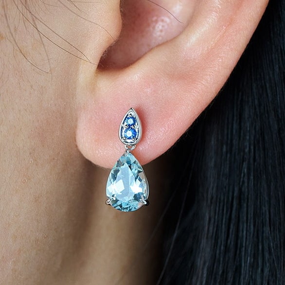 14k Gold 3.66 Ct Natural Aquamarine & Sapphire Earrings: Ref:231166232 // gold content:14k gold // main gemstone:aquamarine // shape:pear // carat weight:3. 66ct // color:blue // treatment:natural // // adjacent gemstone 2 : sapphire // shape:round //