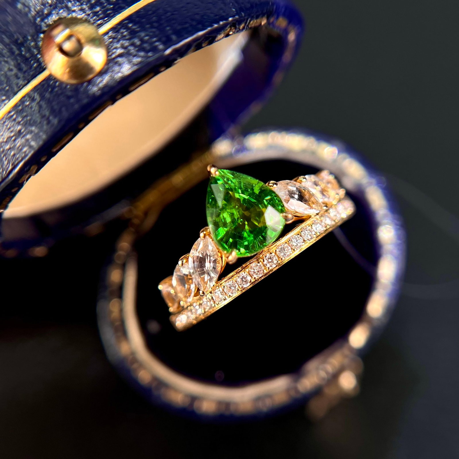 14k Gold 1.94 Ctw Natural Tsavorite & Sapphire Ring: Ref:231166405 // gold content:14k gold // ring size:7. 25us // // main gemstone:tsavorite // shape:pear // carat weight:1. 25ct // color:green // treatment:natural // // adjacent gemstone 2 :