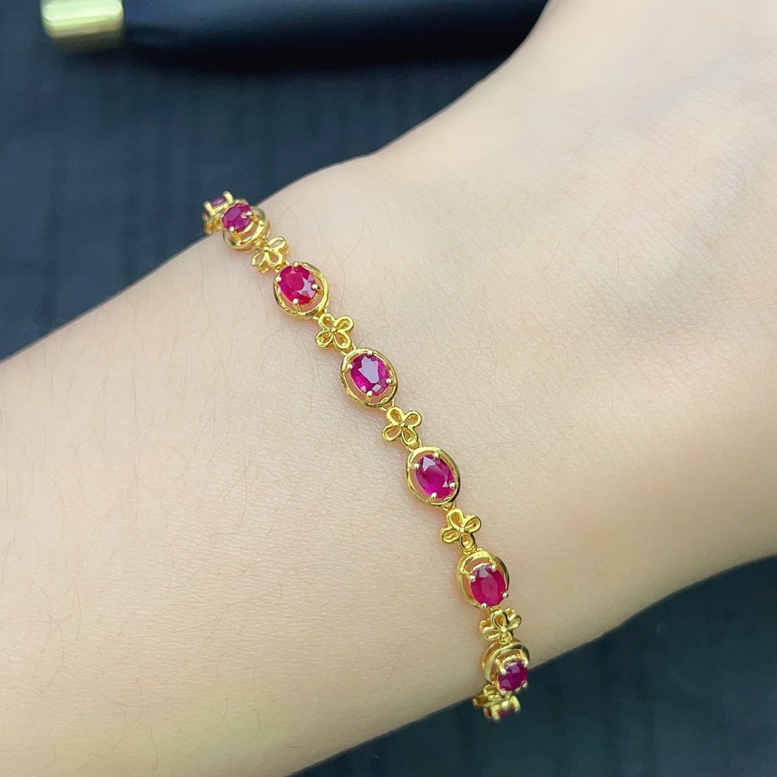 14k Gold 2.80 Ct Natural Ruby Bracelet: Ref:231166423 // gold content:14k gold // main gemstone:ruby // shape:oval // carat weight:2. 80ct // color:red // treatment:natural // Condition: New Low Estimate: 4000.00 High Estimate: 5900.00